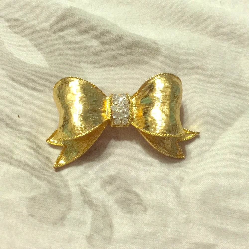 Gold bow brooch